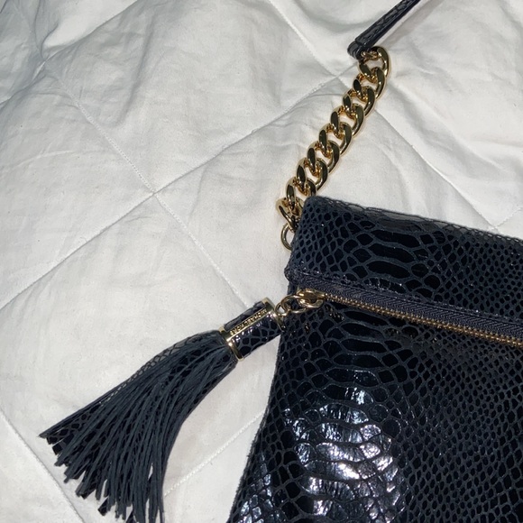 Like new Michael Kors Weston Python Foldover Clutch - Picture 8 of 16